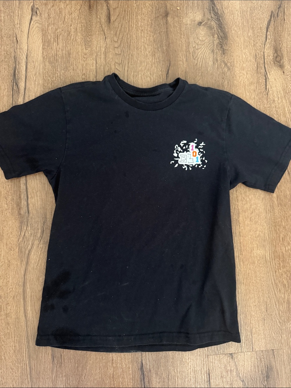 Black Short-Sleeve Kids Tee with Small Colorful Chest Graphic
